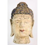 Bepleisterd houten Boeddha hoofd