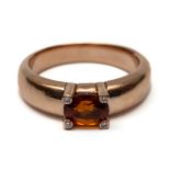 14 kt. Rosé gouden ring met een oranje granaat,