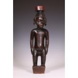 Ivory Coast, Senufo, Korhogo style, standing male figure, ca. 1930's.