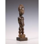 Ivory Coast, Baule, standing female figure.