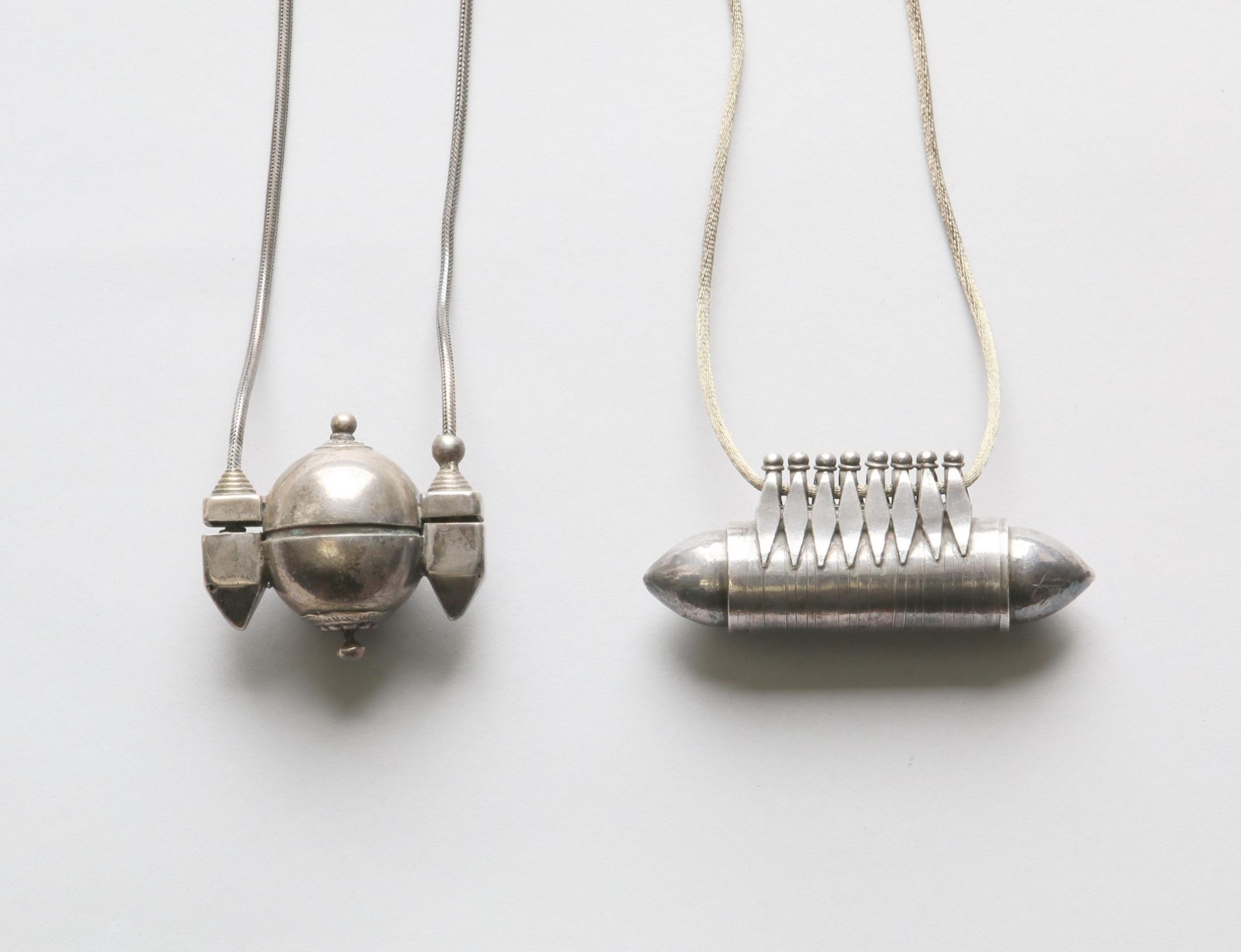 India, Karnataka, two silver amulet containers;