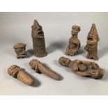 Ghana, Koma, eight terracotta's, possibly antiques, and three eroded iron earing shaped rings.