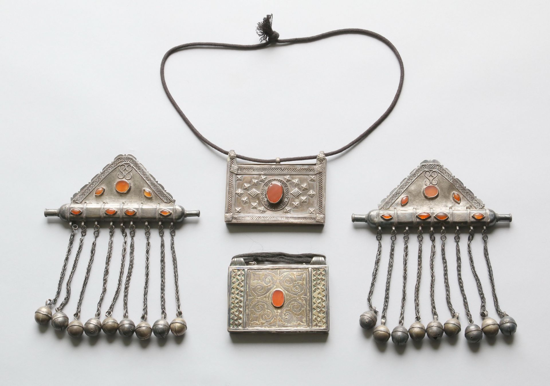 Turkmenistan, Ersari, a pair of amulet containers and a pair of triangular containers;