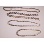 Four silver alloy modern necklaces