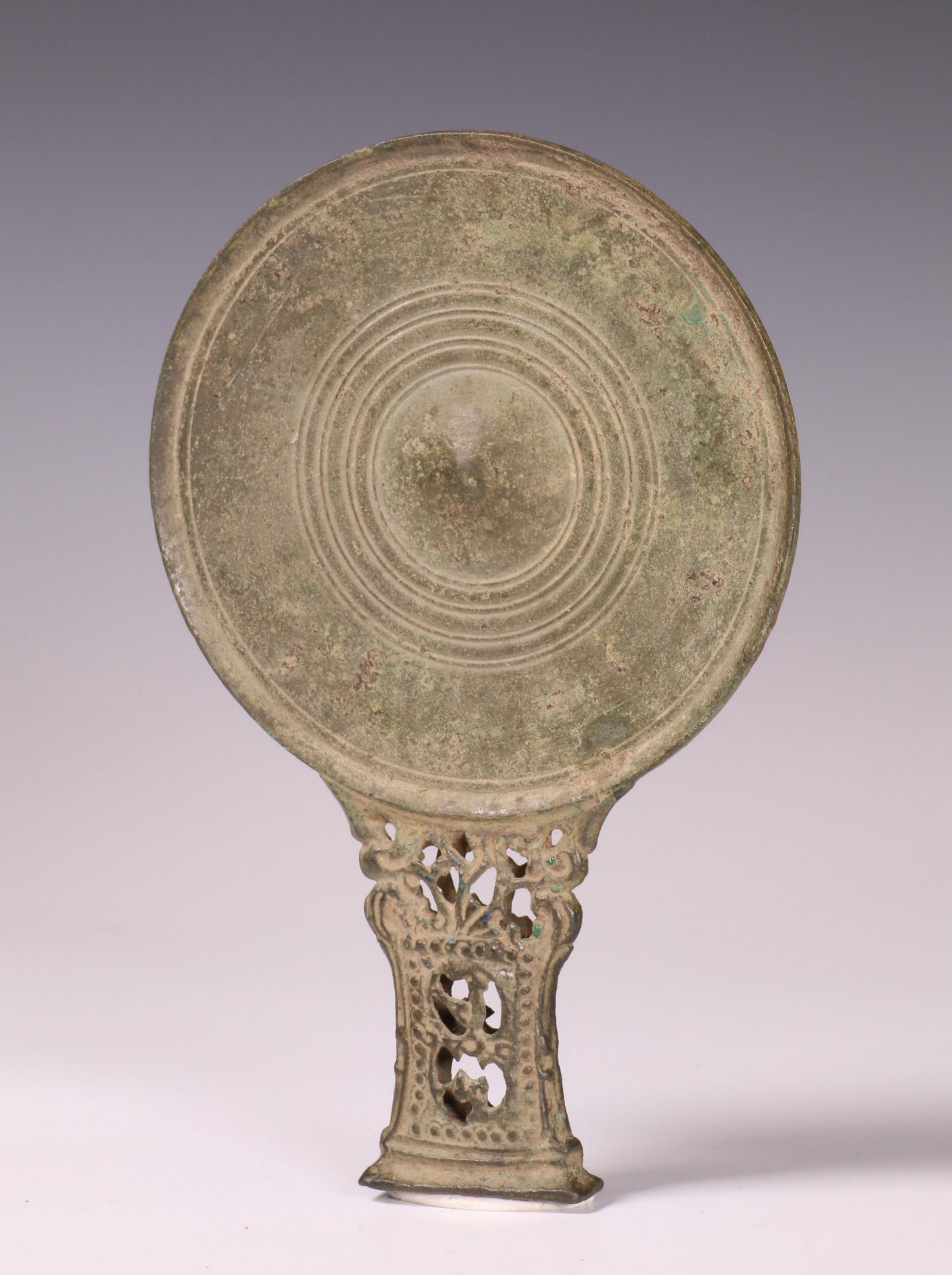 Java, East Javanese period, a bronze mirror, ca. 13th-15th century.