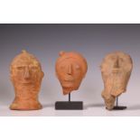 Ghana, Akan, three terracotta funerary heads;