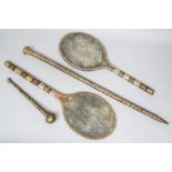 Turkmenistan, two drum sticks in racket shapes, a walking stick and a pipe.