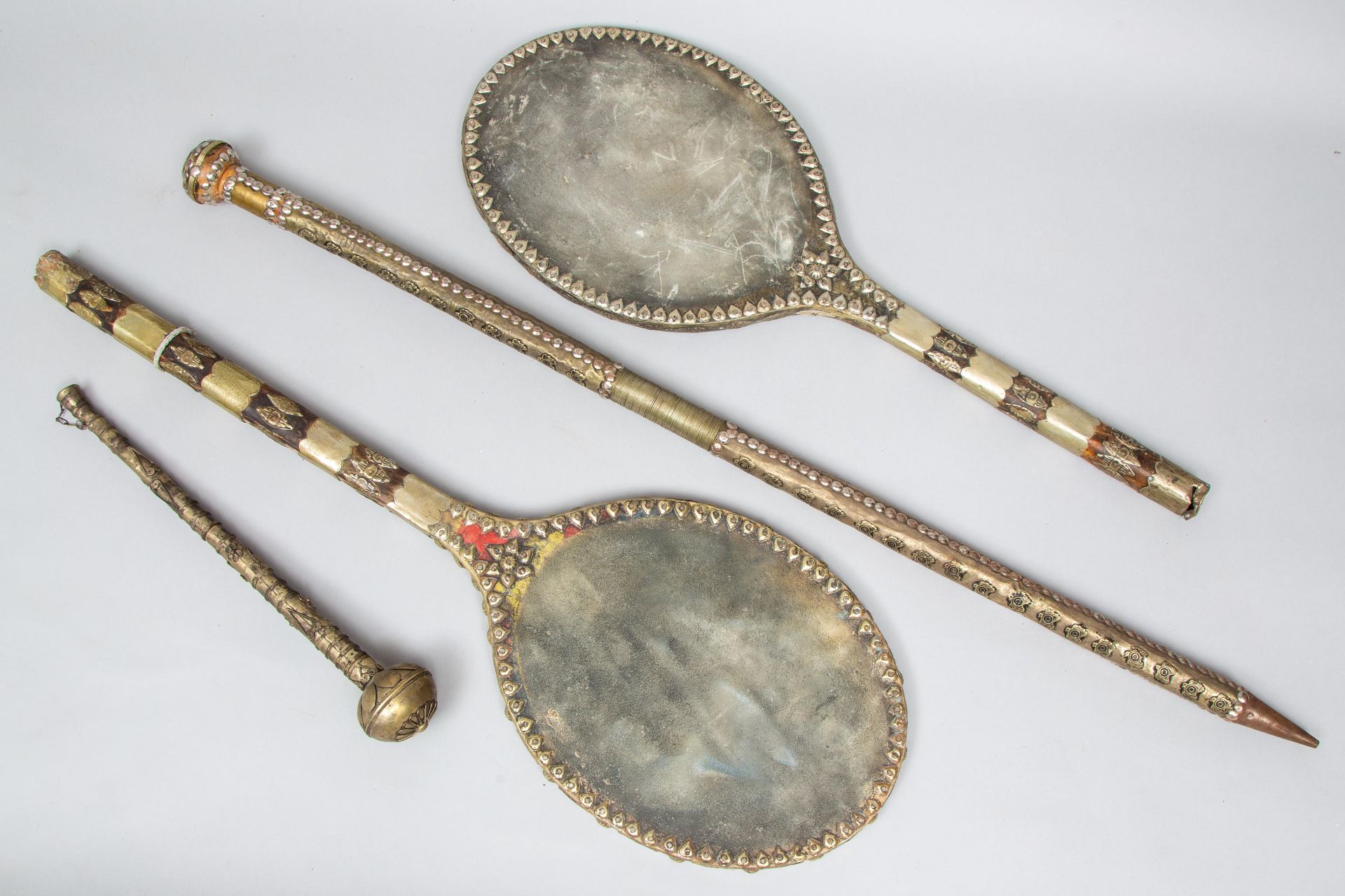 Turkmenistan, two drum sticks in racket shapes, a walking stick and a pipe.