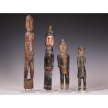 Panama, San Blas Islands, Kuna, four wooden standing anthropomorphic medicine figures, 1st half 20th