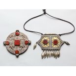 Turkmenistan, Yomud, amulet container and Ersari, round pendant.