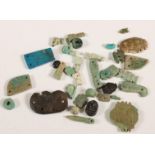 Egypt, a collection faience amuletten and scarab wings, Late Period.