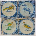Vier blauw aardewerk polychroom dierendecortegels, tweede kwart 17e eeuw;