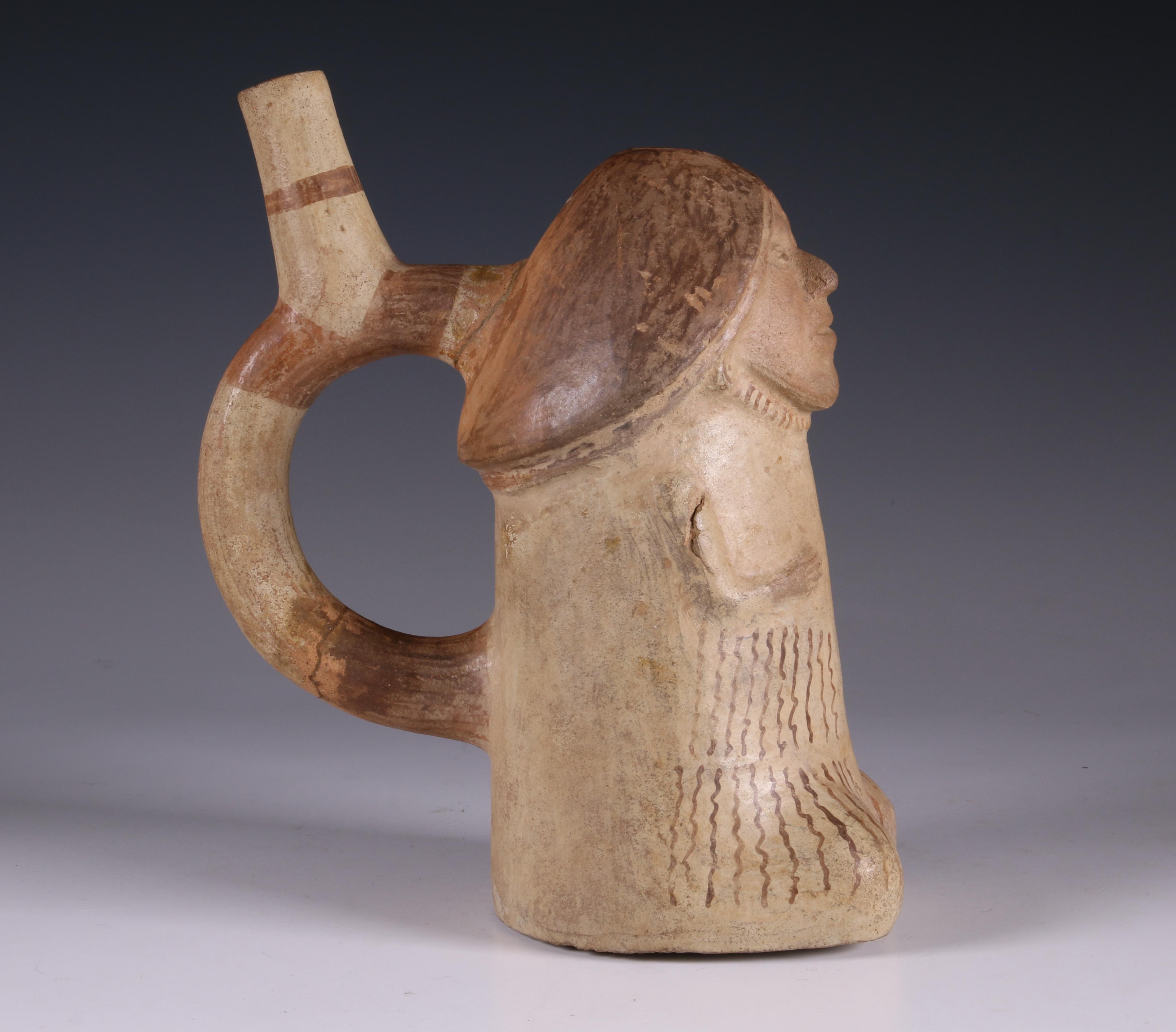 Peru, Moche, terracotta stirrup-spout vessel in the shape of a phallus figure, 500-800 AD