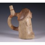 Peru, Moche, terracotta stirrup-spout vessel in the shape of a phallus figure, 500-800 AD