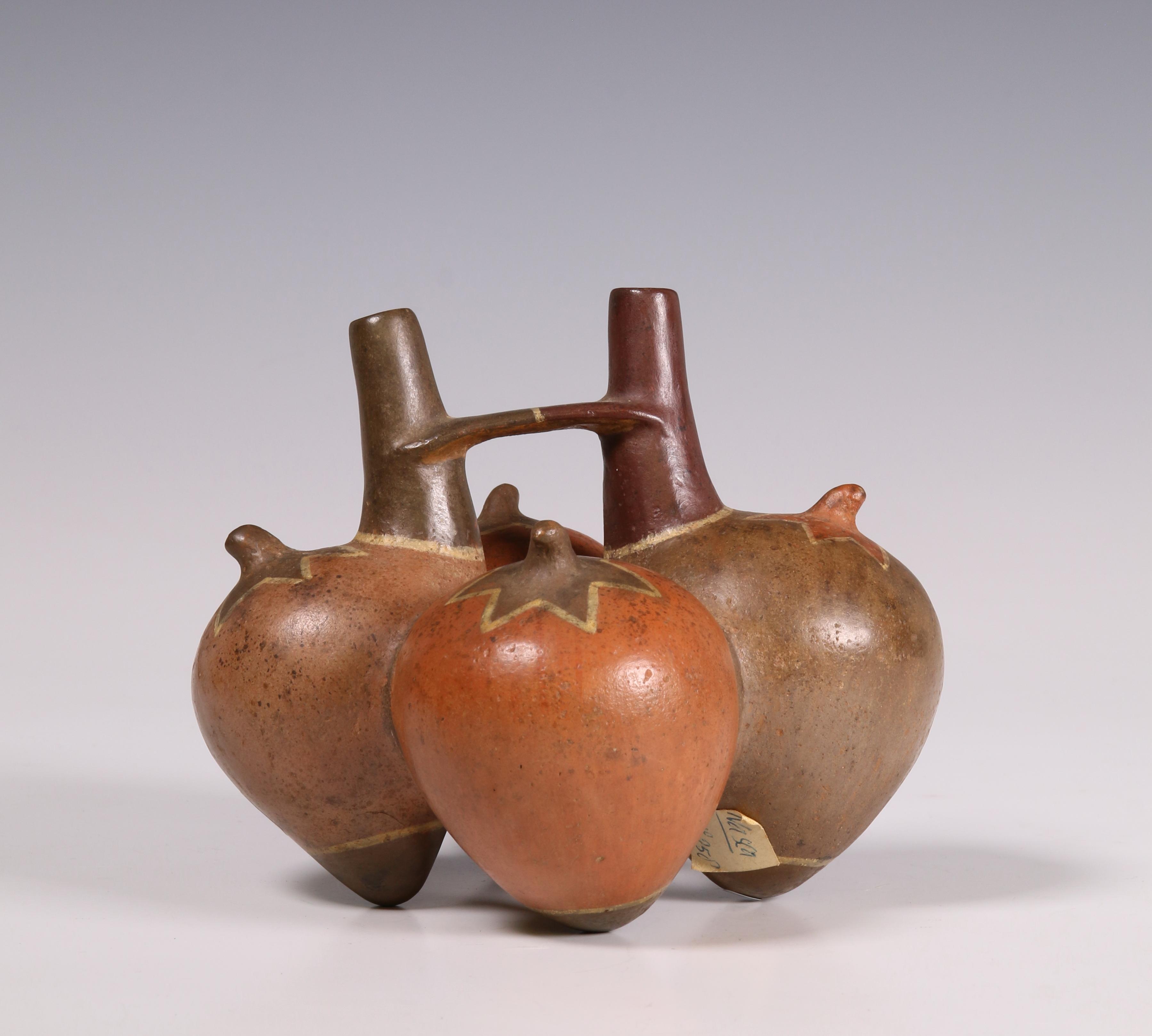 Peru, Nazca, a terracotta double spout vessel, 500-800 AD;