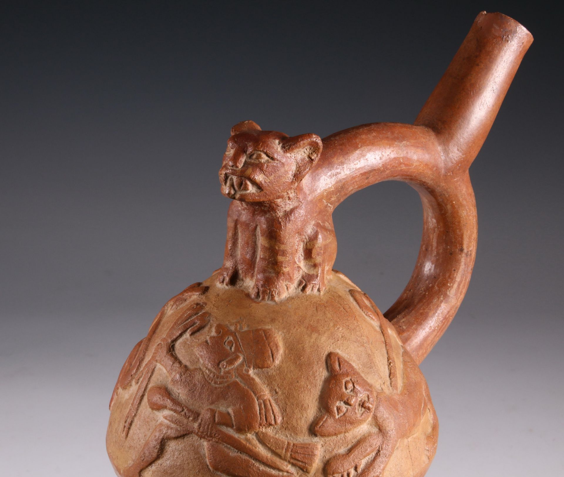 Peru, Moche, a terracotta stirrup-spout vessel, 500-700 AD