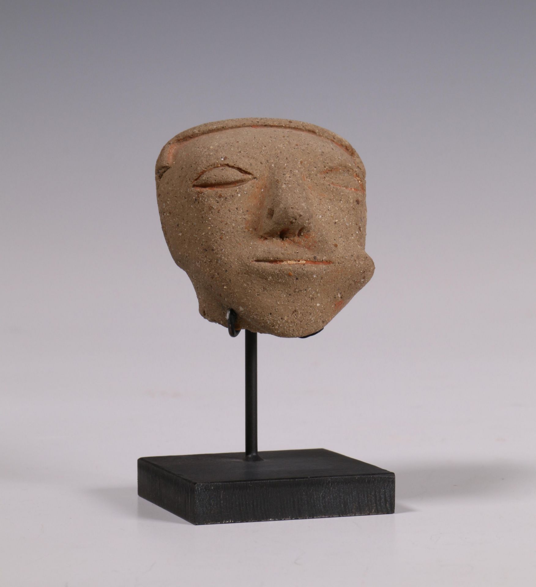 Colombia, Narino, earthenware head of a Shaman with coco leaves in his left cheek