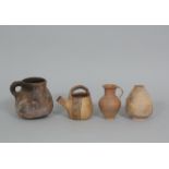 Two antique terracotta jars and North African, one clay pot and one jar.