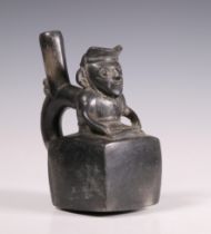 Peru, Chimu, black earthenware stirrup-spout vessel, 800-1200 AD