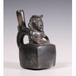 Peru, Chimu, black earthenware stirrup-spout vessel, 800-1200 AD