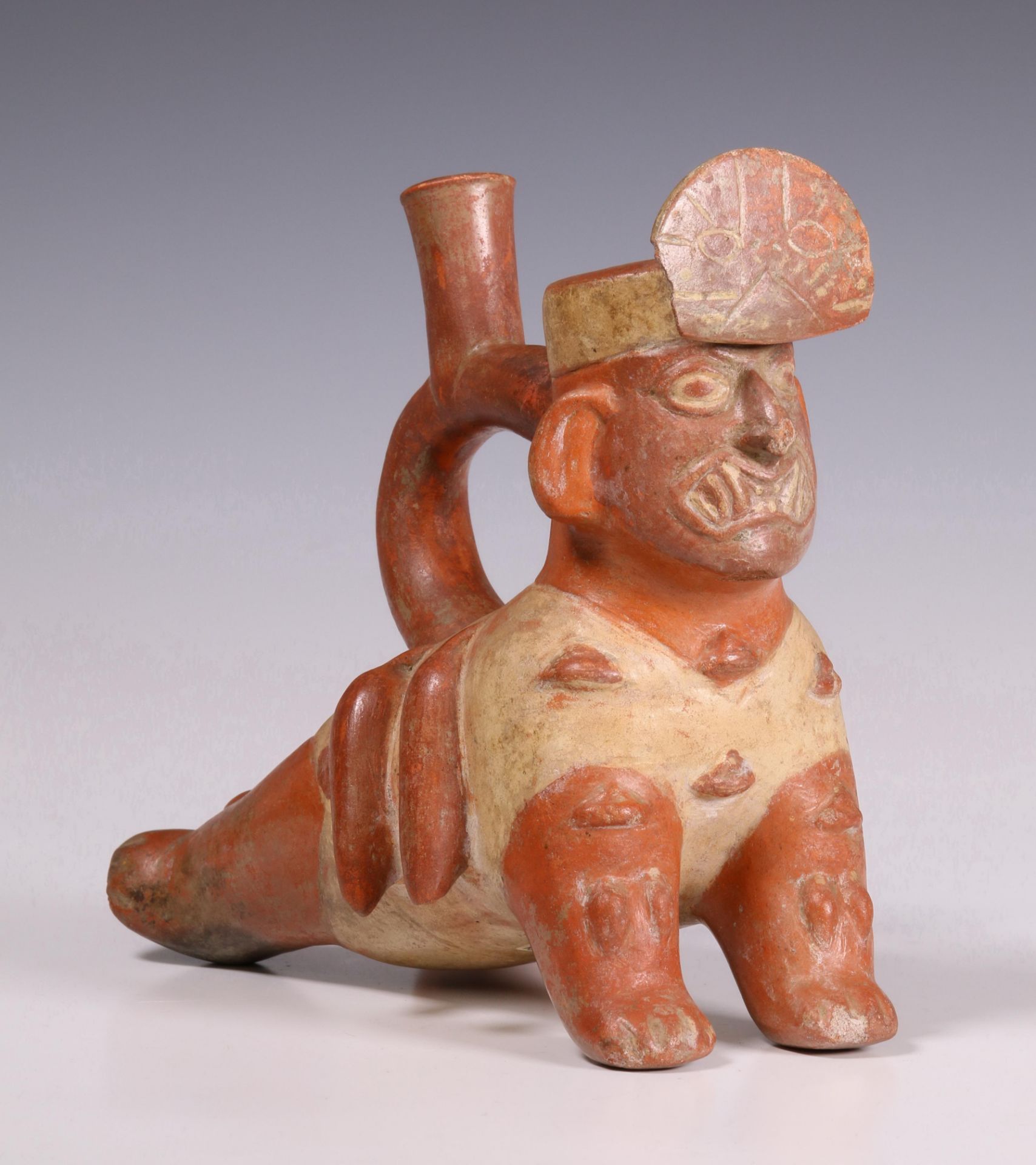 Peru, Moche, a terracotta stirrup-spout vessel, 200-700 AD,