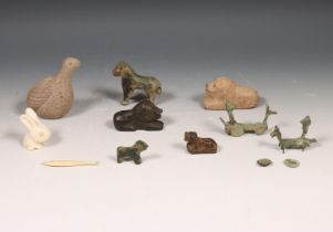 Collection of eight animal figures and two bronze horseman.