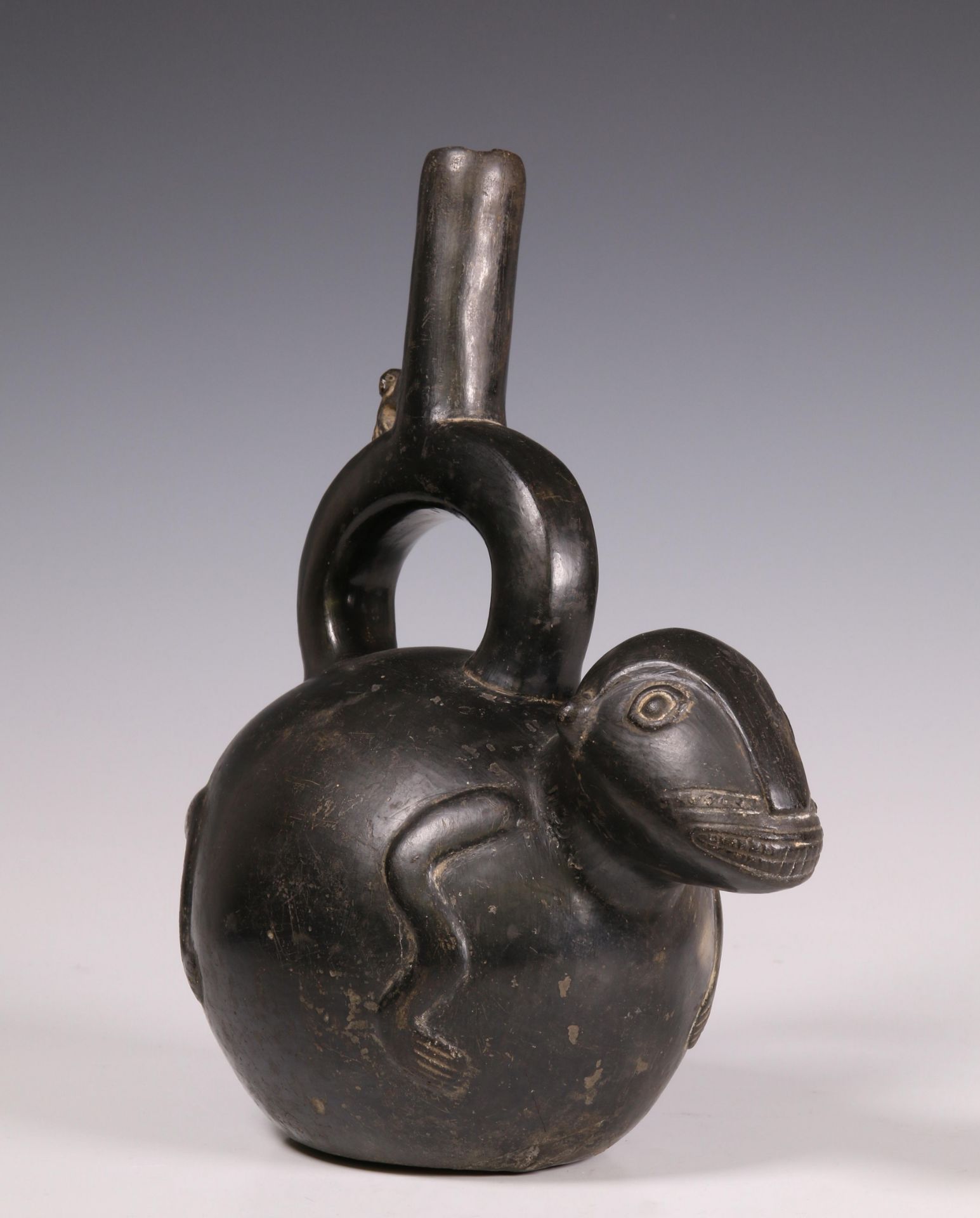 Peru, Lambayeque, black polished earthenware spout vessel,