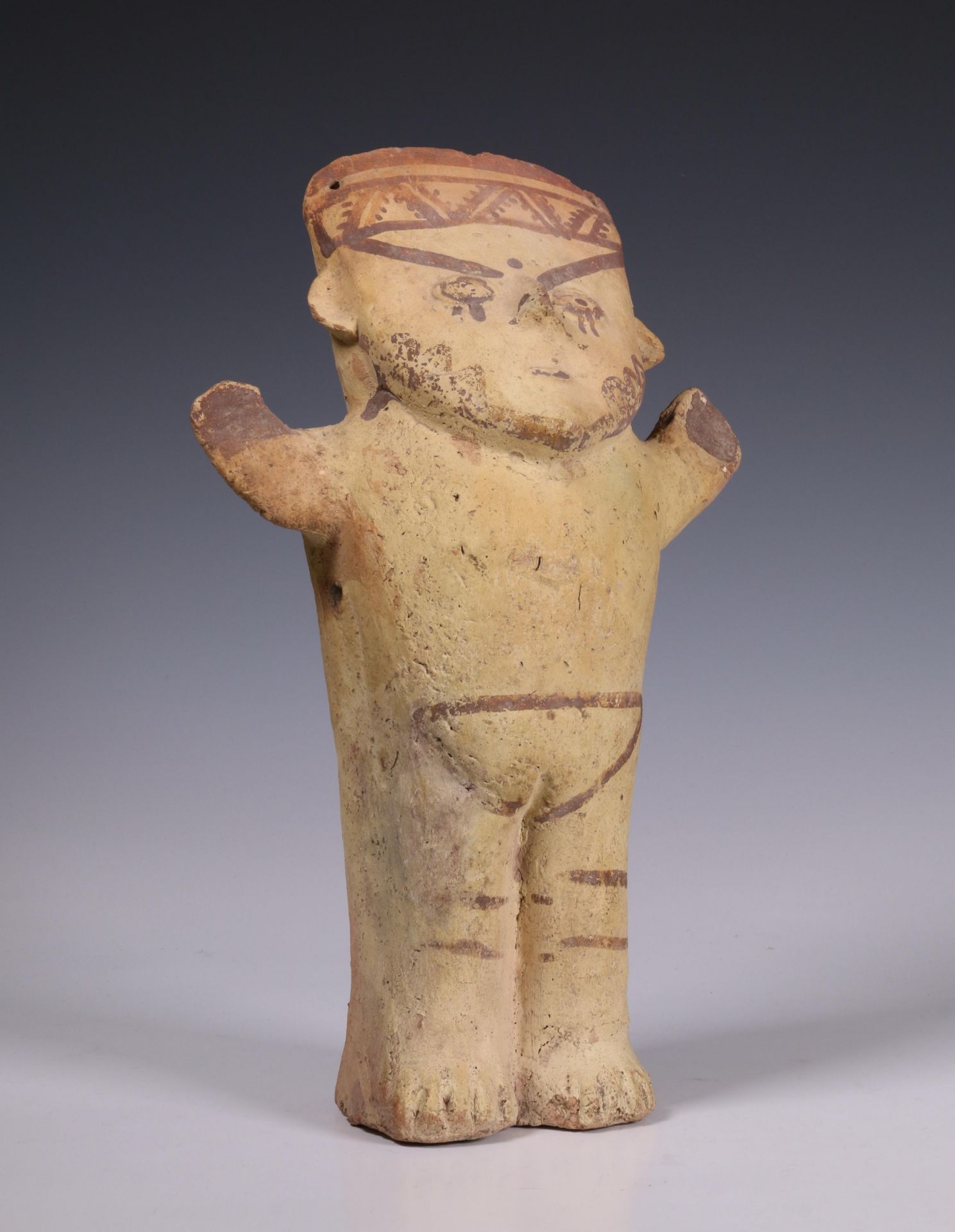 Peru, Chancay, molded terracotta standing figure, 1000-1470,