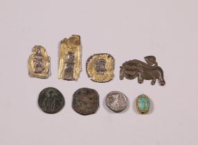 Egypt, faiance scarabe, Late Period, three metal votive plaquettes, a metal relief lion and three co