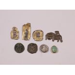 Egypt, faiance scarabe, Late Period, three metal votive plaquettes, a metal relief lion and three co