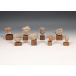 Collection of eight terracotta and stoneware bust aot Teotihuacan