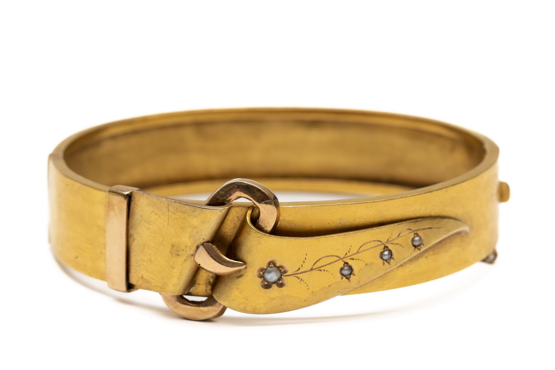 18 kt. Gouden stijve armband, 19e eeuw.