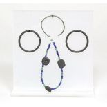 Roman, two black jet bracelets, a bronze bracelet and a beaded bracelet with three black jet beads a