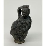 Egypt, black earthenware figure flask, Ptolemaic, 1st century BC - 1st AD.,