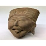 Mexico, Vera Cruz, terracotta bust of a smiling lady, 600-900