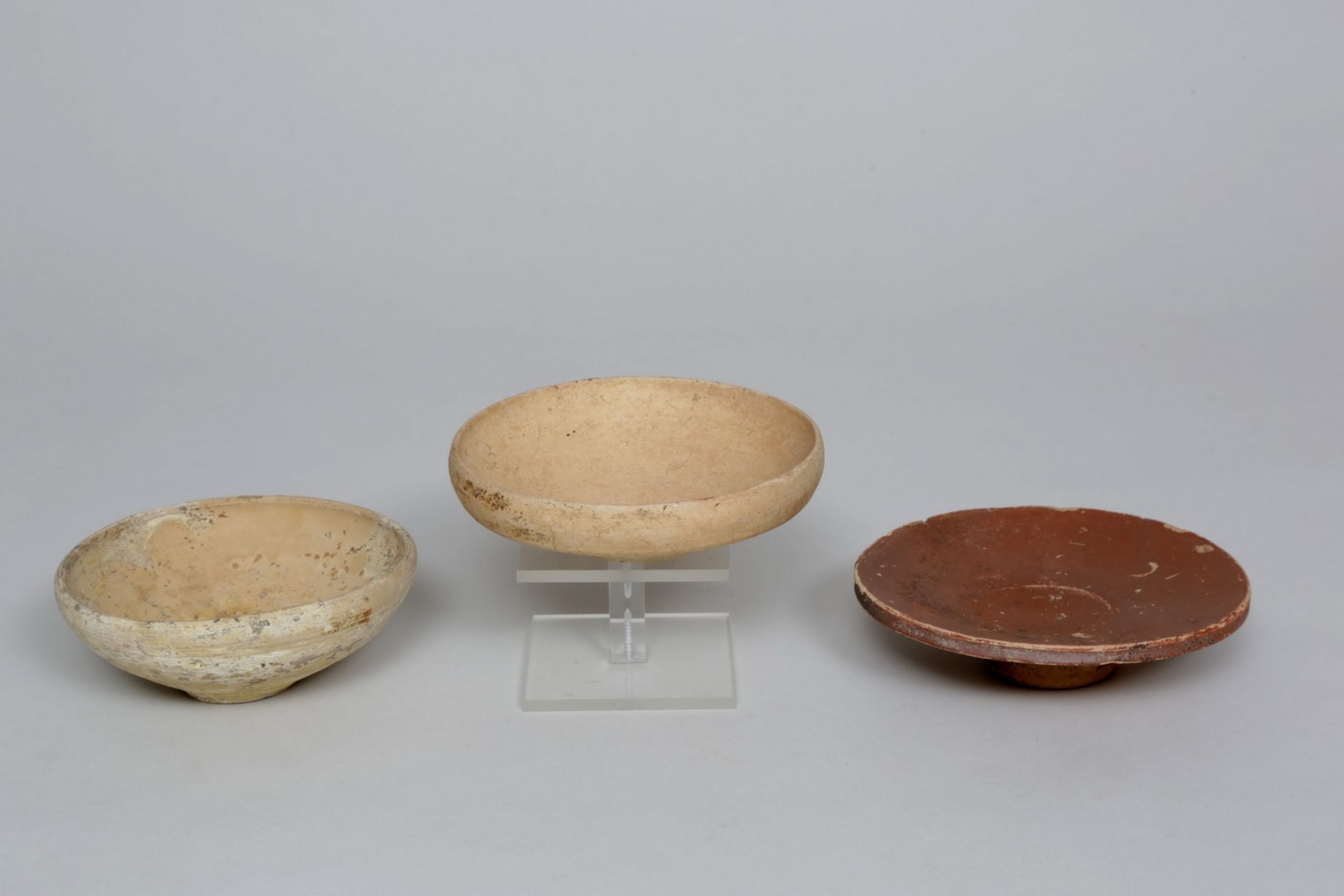 Etruscan, two earthenware dishes, 3rd century BC and a Roman, earthenware dish, ca. 3rd century. - Image 2 of 2
