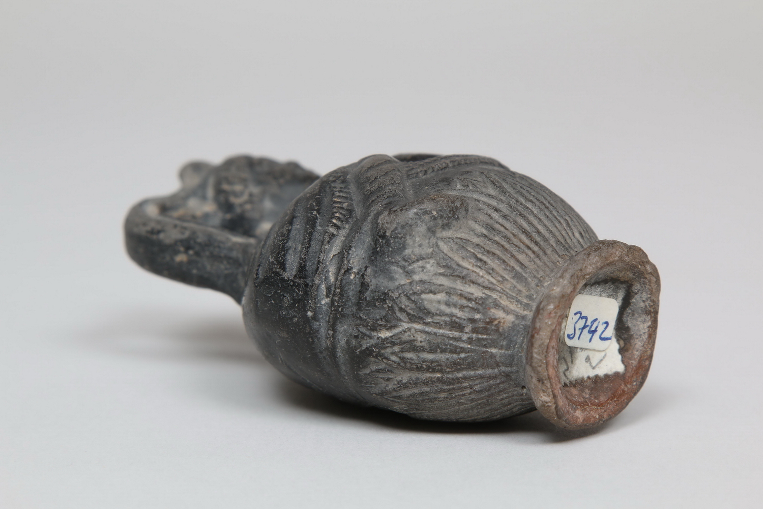 Egypt, black earthenware figure flask, Ptolemaic, 1st century BC - 1st AD., - Image 7 of 9
