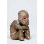 West Mexico, a small seated figure, 1st century BC - 2nd Century AD.