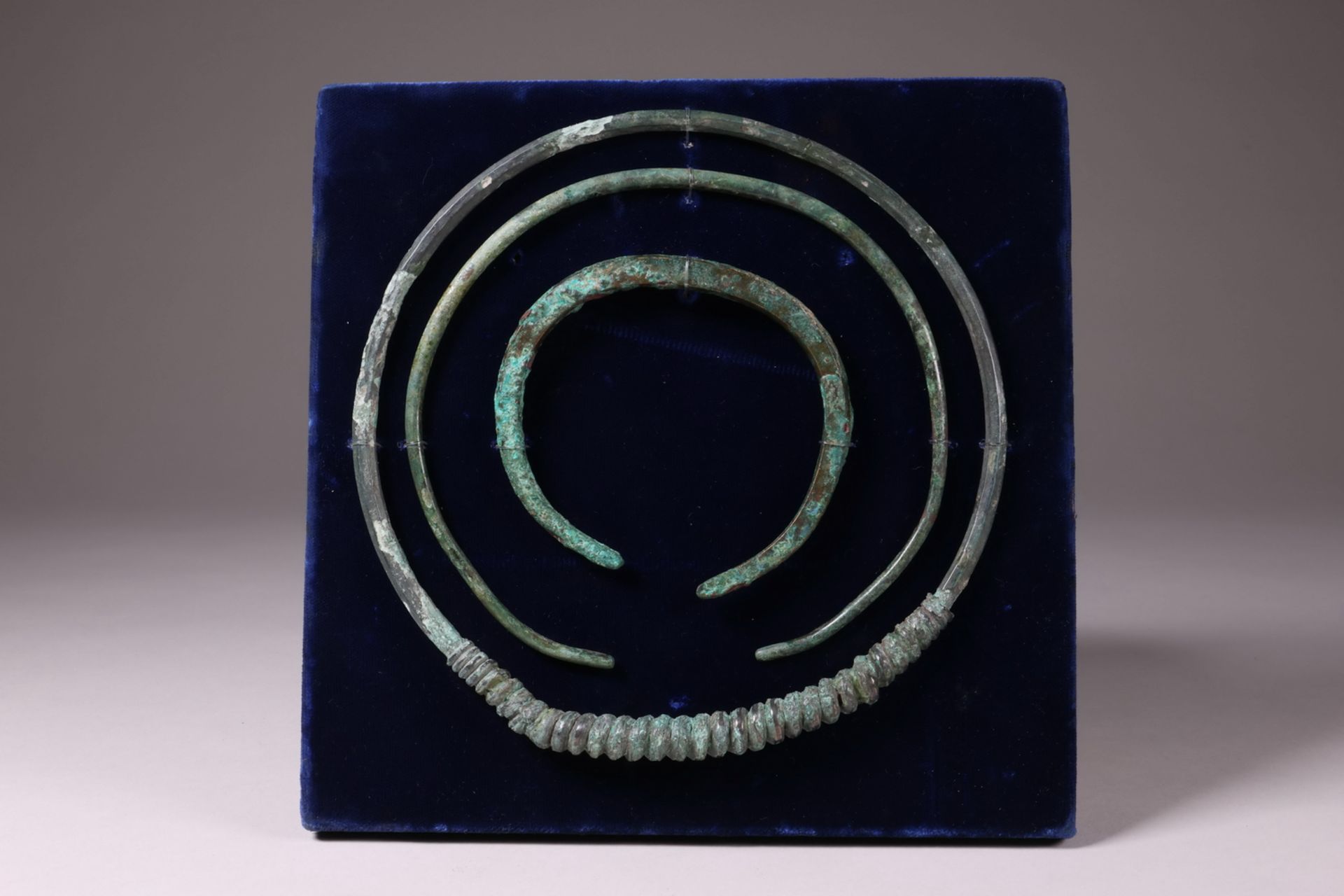 Two Western Europe bronze necklaces and an armband, Bronze Age,