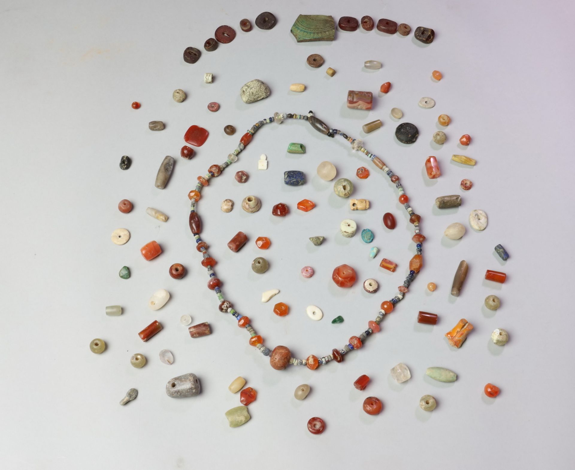 Collection of antique beads, agate, glass, amber and other.