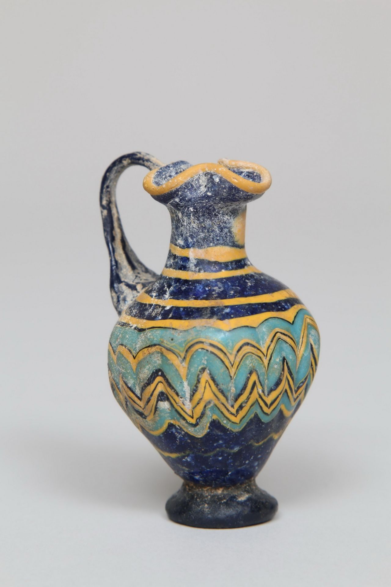 Greek, blue glass oinochoe, 4th - 3rd century BC