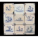 9 blue and white colored earthenware tiles