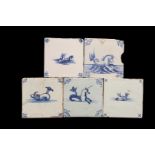 5 blue and white colored earthenware tiles