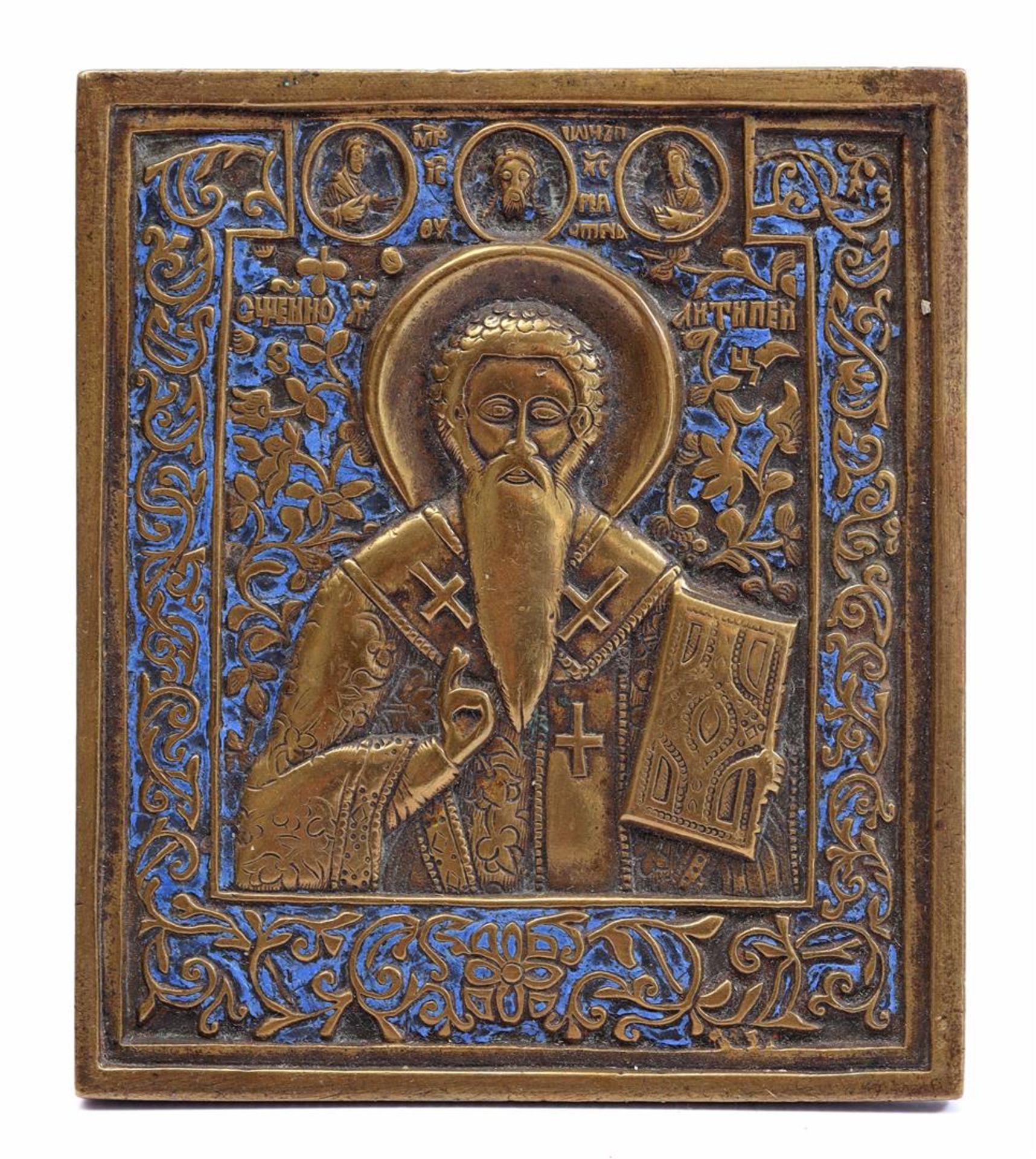 Bronze travel icon depicting various saints 