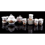 11-piece porcelain tea set with gold accents and various decors