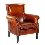 Leather armchair with black edges and copper tacks finished