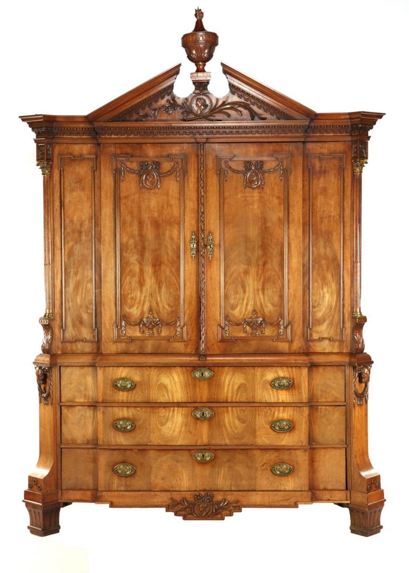 Mahogany veneer on oak cabinet with tympanum hood with vase on top