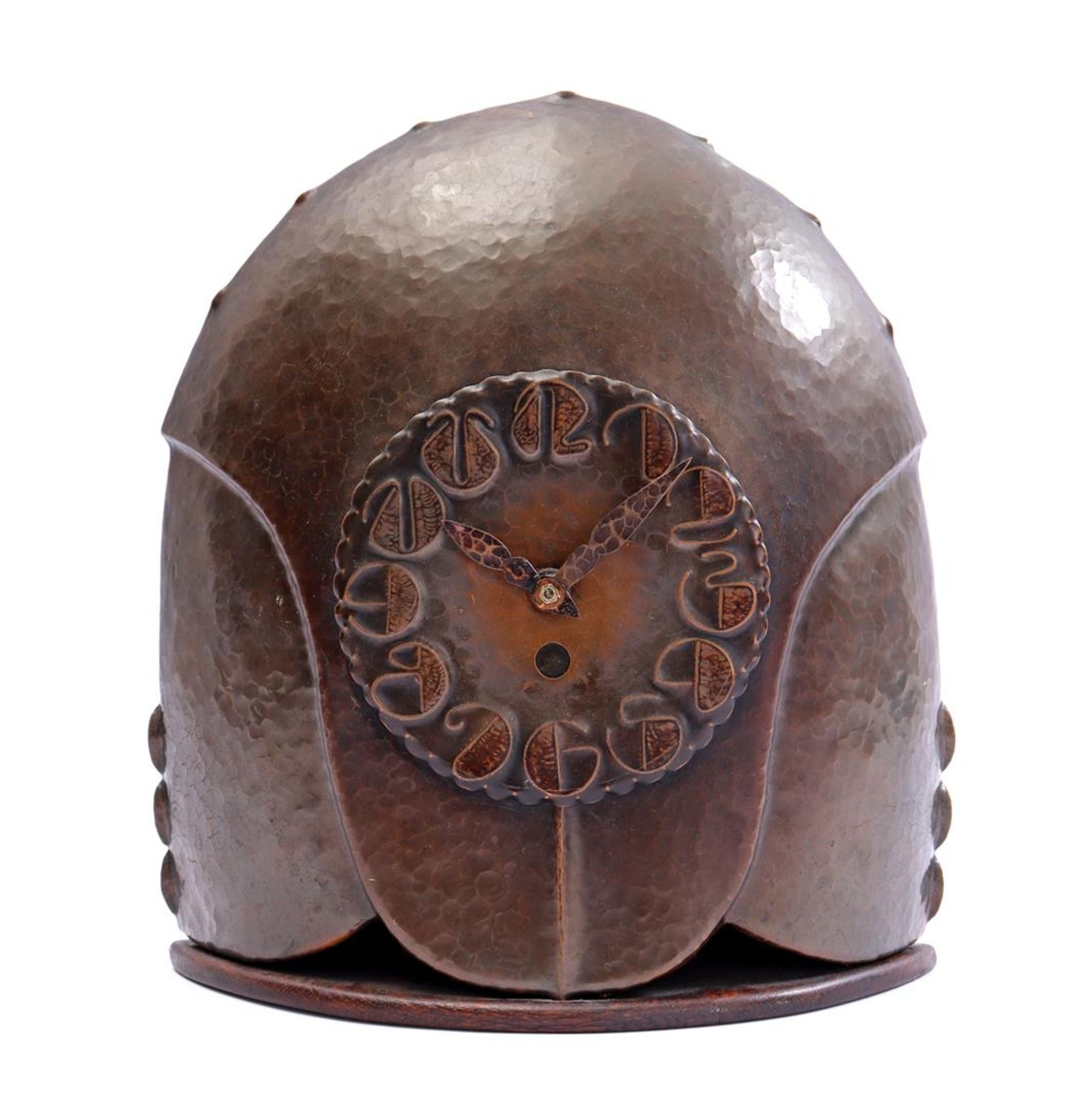 Hammered copper Amsterdam School table clock