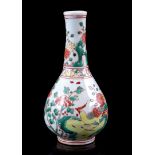 Famille Rose porcelain pointed vase with a decoration of birds among flowers