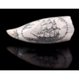 Engraved tooth of a sperm whale with decor of USS Tacony